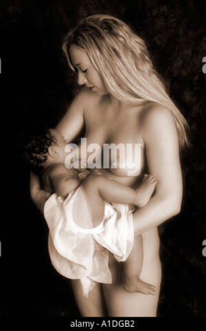 naked mothers lactating - Nude mother breastfeeding infant son Stock Photo - Alamy