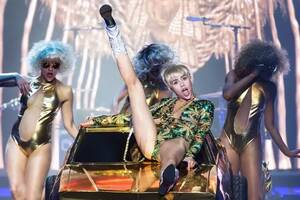 Miley And Selena Sexy - Miley Cyrus' Bangerz tour in pictures: Soft porn or artistic genius? -  Irish Mirror Online