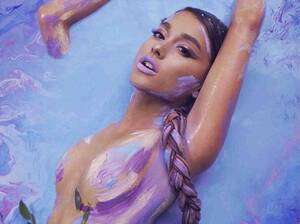 Ariana Grande Porn Tits - Ariana Grande flashes the flesh in nothing but BODY PAINT | Daily Mail  Online