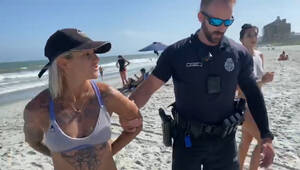 nude beach girl videos - I'm not nude!': Acrobat handcuffed after wearing thong to Myrtle Beach -  National | Globalnews.ca