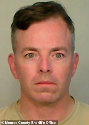 beach spy cam voyeur - Man charged with voyeurism 'slid camera under hotel room door' | Daily Mail  Online