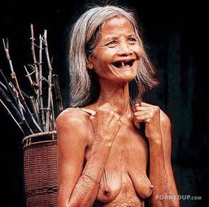 Deflated Tits Porn - toothless old granny shows off her saggy deflated tits