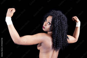 african american ghetto girl nudes - pretty young african american girl showing muscles with naked ba Stock  Photo | Adobe Stock