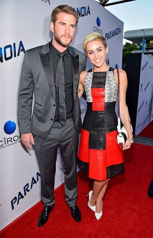 Miley Cyrus Christmas Porn - Miley Cyrus and Liam Hemsworth walk the red carpet and more style news