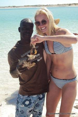 interracial hot wives on vacation - White women with black men flirting, swimming and relaxing-- all part of the