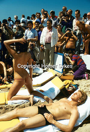 cannes beach topless - CANNES FILM FESTIVAL TOPLESS MODEL | HOMER SYKES