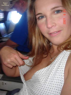 Flashing Small Tits Downblouse - Girl Flashing On A Plane - Blonde Hair, Blue Eyes, Flashing Tits, Flashing