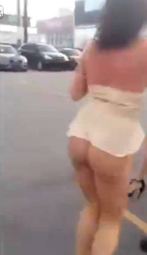 Catfight Porn Captions - A girl exposes her bum