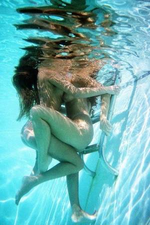 naked lesbians kiss underwater - Two girlfriends kissing and getting close underwater