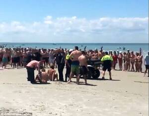 crowded beach sex - Four teens 'had sex in sea' as dozens cheered on July 4th | Daily Mail  Online