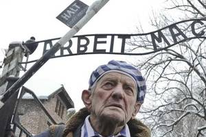 Nazi - Nazi camp website hacked with child porn on anniversary