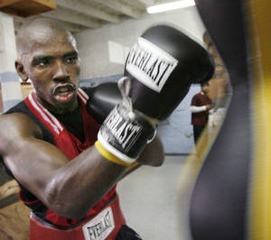 Level Dawg Pound - Yusaf Mack, 36, a former professional light heavyweight boxer, in his house  in