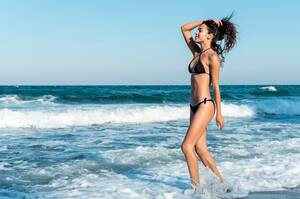 beautiful brunette nude beach - Page 12 | Beach Models Images - Free Download on Freepik