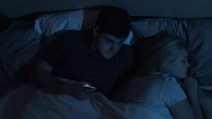 husband sleeping - Cheating husband phone bed sleeping wife night Stock Video Footage by  Â©golubovy #456041800