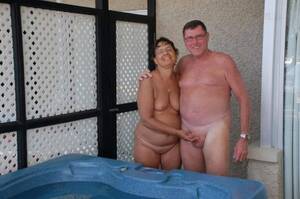 couples home nudity - nudistlifestyle: Nudist couple at home pose for a pic. Well she had to hold  on to something, she might fall over. yes hold on tight Tumblr Porn