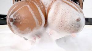 mom juicy tits - Chocolate mom shows her big juicy tits in a XXX bubble bath | AREA51.PORN