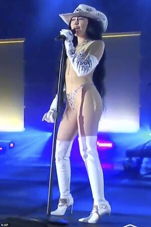 Noah Cyrus Porn - Noah Cyrus sizzles in TWO looks as she hits the stage in nearly naked sheer  look at CMT Music Awards | Daily Mail Online