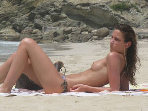 hair ling topless beach voyeur - Topless Slender Tanner On Beach - May, 2010 - Voyeur Web Hall of Fame
