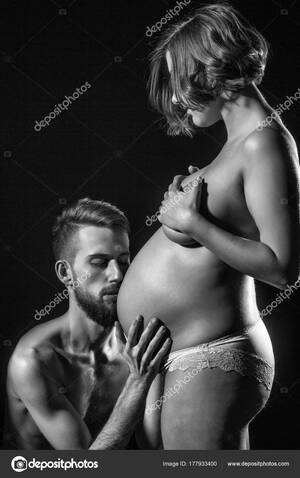 hot pregnant couple nude - Bearded man and pretty pregnant woman with naked round belly Stock Photo by  Â©Tverdohlib.com 177933400
