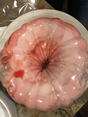 Drunk Jello - A: This is what happens when you leave a layered jello mold in warm water  to release from the pan for too long on thanksgiving because you're drunk,  and then put it