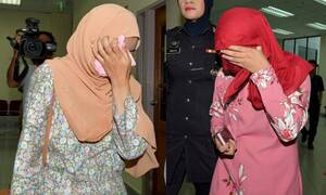malaysian lesbian sex - Two Malaysian women caned under Islamic law for lesbian sex | Daily Mail  Online