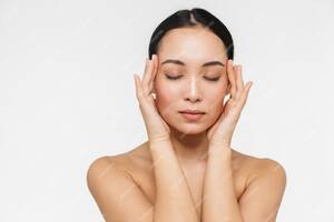 cute asian posing nude - Premium Photo | Beautiful young pretty asian woman with healthy skin posing  naked isolated over white wall.