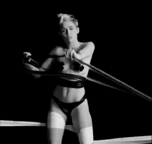Miley Cyrus Porn Bondage - 10 Racy GIFs From Miley Cyrus' Bondage Video That'll TIE YOU UP IN KNOTS