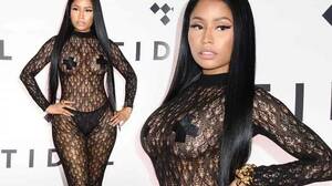 Celebrity Porn Nicki Minaj Sexy - Nicki Minaj makes a statement in sheer black lace dress with nipple pasties  after blasting Kanye West - Mirror Online
