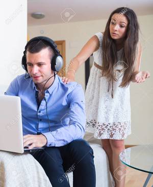 Husband And Wife Watch Porn Together - Furious young wife catching husband watching porn at home Stock Photo -  52305476