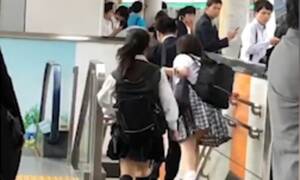 Busty Japanese Schoolgirl Porn - Japanese schoolgirls chase down a 'chikan' - men who grope women on trains  - on a station platform | Daily Mail Online