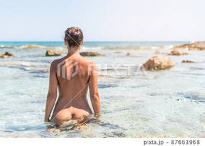 accident beach nude - Naked woman sitting in sea water on nude beach - Stock Photo [87663968] -  PIXTA