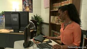 ebony ladyboy office - Small tits black shemale lady dominatrix in office roleplay dominates her  colleague and anal fucks him bent over table - XNXX.COM