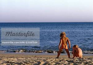 naked beach pissing - Nude children playing on beach, rear view - Stock Photo - Masterfile -  Premium Royalty-Free, Code: 696-03397544