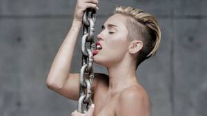 cyrus - Miley's nude video breaks viewing records - NZ Herald