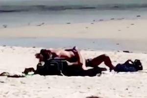 beach senior trip nude - Couple filmed having sex in front of sunbathers on Australian beach popular  with tourists - Mirror Online
