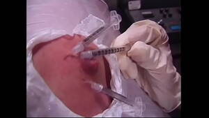 needle injection - A naughty brunette and a busty redhead bitches wrapped a guy's body with a  film and injected him with syringes - XVIDEOS.COM