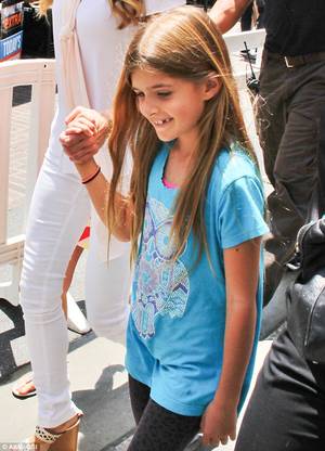 Hd Tiny Teen - Lapping up the attention: Her little girl looked overjoyed to be with her  parent as