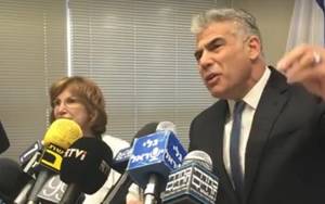 Marcy Cobb Porn - Yesh Atid leader Yair Lapid, right, is accompanied by MK Yael German as he
