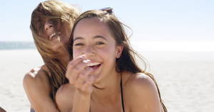 Best Friend Kissing Wife Porn - Close up portrait of teenage girl friends hugging each other on vacation -  4K stock footage