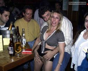 drunk flashing upskirt - Pantyless drunk hotwife at club