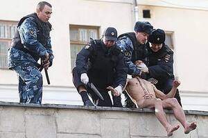 art pussy riot pregnant porn - Naked artist who nailed his TESTICLES to ground in bizarre protest now cuts  EAR off in public - Irish Mirror Online