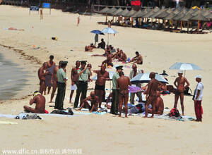 best sunbathing beach - Two detained for swimming, sunbathing in the nude[1]|chinadaily.com.cn