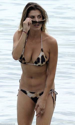 Elisabetta Canalis Leather - Elisabetta Canalis and boyfriend Brian Perri visit her native Sardinia