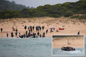 costa del sol beach topless - Dozens of African migrants storm Spanish holiday beach popular with Brits  stunning naked bathers | The Sun