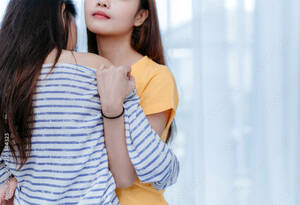 Asian Schoolgirl Forced Lesbian - Same sex asian lesbian couple lover embrace and kiss erotic scene in the  bedroom happiness feeling, LGBT sexuality female hug living together at  home. Stock Photo | Adobe Stock