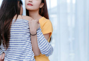 asian girl forced lesbian sex - Same sex asian lesbian couple lover embrace and kiss erotic scene in the  bedroom happiness feeling, LGBT sexuality female hug living together at  home. Stock Photo | Adobe Stock