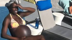 black pregnant stomachs - US model Porsche Thomas has been body-shamed for showing her belly while  nine months pregnant.