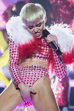 Artistic Soft Porn - Miley Cyrus' Bangerz tour in pictures: Soft porn or artistic genius? See  Video and Pictures