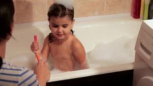 hot naked lesbian bath sex - Curly girl bathes in a bath with foam. Draws a multi-colored pencils on