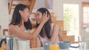 Asian Schoolgirl Lesbian Porn - Asian Lesbian lgbtq women couple have breakfast at home., People Stock  Footage ft. 4k & asian - Envato Elements